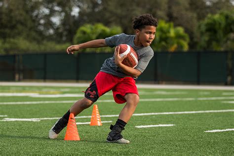 How to Hold a Football When Running: A Comprehensive Guide to Grip, Balance, and the Art of Avoiding Squirrels